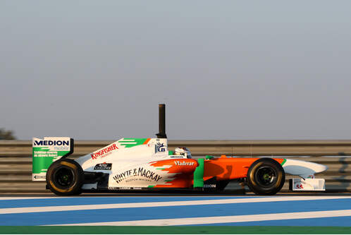 Force-India-VJM04-Sutil-Test-2011-f498x333-F4F4F2-C-5f284361-454746.jpg